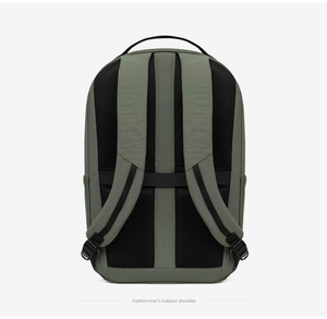 Detail of ergonomic breathable shoulder straps and luggage strap on olive green backpack