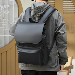 Men's black backpack featuring geometric 3D pattern and waterproof matte fabric detail
