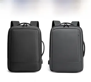 Vista detallada de mochilas de negocios en negro y gris con puerto de carga USB externo