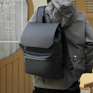 Detail of the geometric triangular textured surface on black waterproof laptop backpack