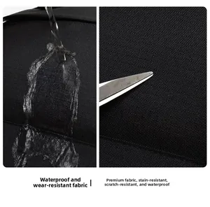 Detail of waterproof and scratch-resistant black fabric on the large commuter backpack