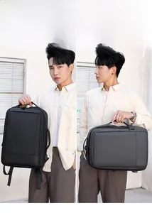 Mochila expandible negra con doble asa para transporte vertical y horizontal cómodo