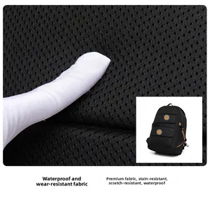 Detail of waterproof scratch-resistant honeycomb fabric for durable black backpack