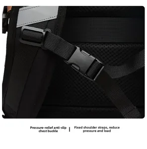 Detail of adjustable chest buckle and breathable mesh straps on black backpack