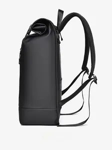 Side view of matte black 16-inch laptop backpack with roll-top and padded straps