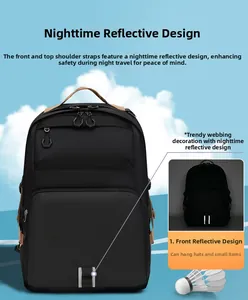 Detail view of black commuter backpack featuring safety reflective strips and front webbing