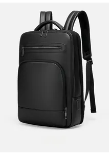 Side view of black PU leather business backpack with USB port and pebbled texture detail