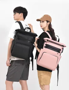 Front detail of large picnic cooler backpacks in black and pink with roll-top closure