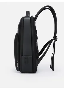 Side view of black PU leather business backpack featuring a USB charging port and dual layers