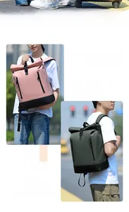 Detail of pink and dark green waterproof roll-top backpacks with vertical zippers