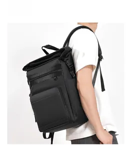 Side view of a black waterproof insulated picnic backpack with roll-top closure for outdoor use