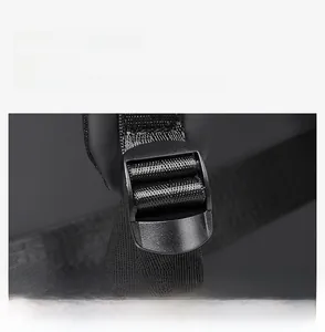 Detail view of the durable plastic buckle for adjustable shoulder straps on travel backpacks