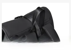 Detail of waterproof matte laptop backpack showing reinforced handle and metal zipper