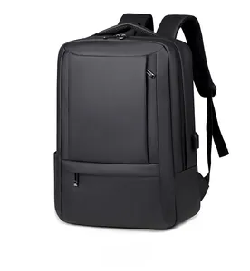 Detail view of water-resistant business backpack with side USB charging port and zipper