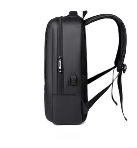 Side view of black business backpack showing USB charging port and breathable mesh strap