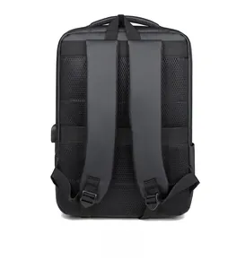 Detail of breathable honeycomb back panel and luggage strap on black laptop backpack