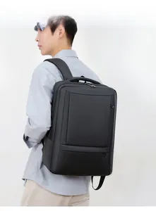 Man wearing high-density black water-resistant business backpack with padded straps