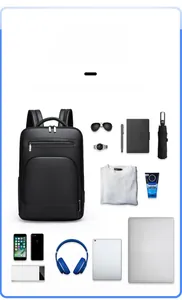 Detailed interior storage of a black PU leather backpack with organized compartments