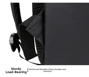 Detail of reinforced triangle stitching on shoulder straps of black laptop backpack