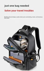 Detail view of large capacity black backpack with multi-layer pockets and laptop compartment