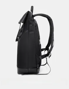 Side view of black casual backpack featuring ergonomic shoulder straps and side zipper pocket