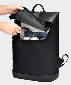Detailed interior of black large capacity backpack with laptop and headphone storage
