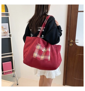 British style large red tote bag with plaid pattern pockets and shoulder straps