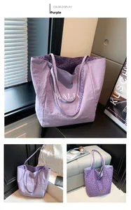 Detail of purple tote bag with leopard print lining and stylish Maliw lettering