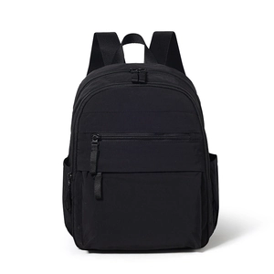 Front view of black nylon backpack featuring dual zippers and durable carry handle