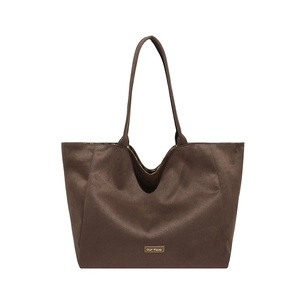 Minimalist brown suede tote bag with leather logo patch and thin shoulder straps