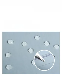 Detail showing water-resistant light blue fabric texture and precision zipper craftsmanship