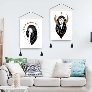 Minimalist celestial wall tapestry set with gold moon phases and elegant tassel details