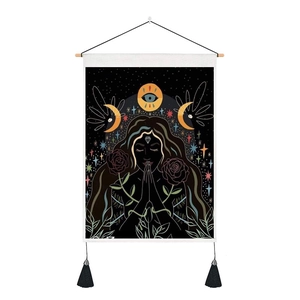 Artistic moon girl tapestry with tarot elements, roses, and wooden hanging rod