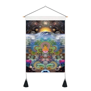 Close-up of printed tapestry texture with Buddha and mandala design on wood rod