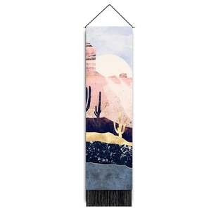 Detail of Nordic tapestry featuring abstract desert landscape with black tassels and top rod