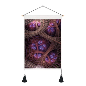 Detail of bohemian fractal tapestry featuring purple geometric patterns and black tassels