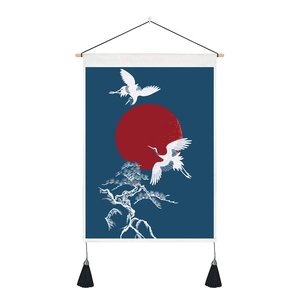 Detail of Chinese crane tapestry featuring red sun, pine trees, and black tassels