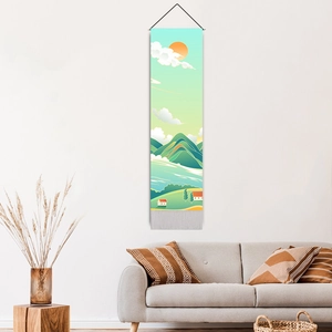 Modern landscape tapestry featuring mountains and red sun in a minimalist living room