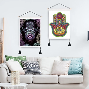 Hamsa Hand and Mandala tapestries with wooden poles and tassels for home wall decor