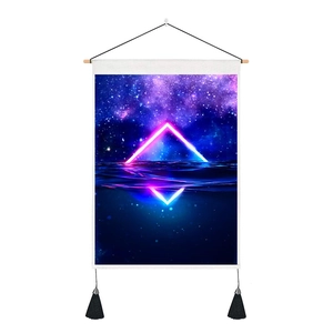 Detailed macro view of the cotton linen space tapestry with wooden pole and black tassels