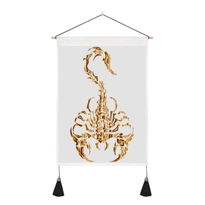 Detail of Nordic golden scorpion wall tapestry with wooden hanger and black tassels