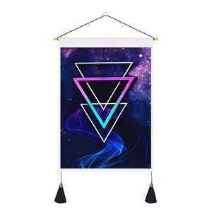 Detail of sci-fi tapestry featuring galaxy nebula prints and 3D geometric triangles