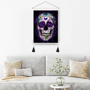 Bohemian sugar skull wall tapestry with purple floral motifs and black tassels decor