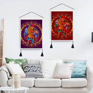 Tiger wall tapestries with mandala patterns and tassels on a white living room wall