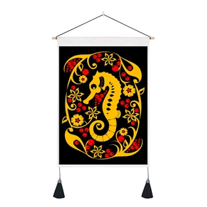Detail of colorful seahorse tapestry with folk floral patterns and black tassel accents