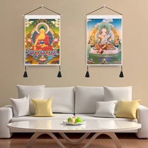 Buddhist Shakyamuni and Guanyin wall hangings with wooden rods and black tassels