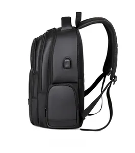 Vue latérale du sac à dos business noir avec port USB et bretelles rembourrées