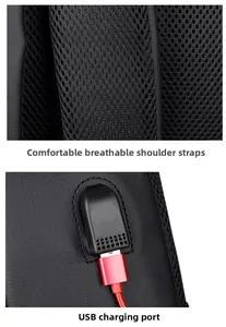 Détail des bretelles en maille respirante et du port de charge USB sur le sac à dos noir