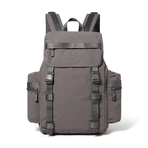 Detail view of the durable dark grey 25L outdoor backpack with nylon straps and buckles