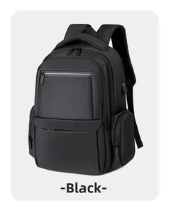Detail of black business backpack showing external USB port and multi-layer zippers